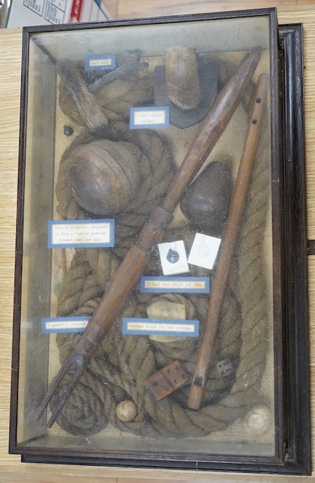 A display case of naval objects, 57 x 37cm. Condition - fair